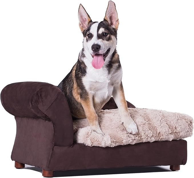 Golden retriever happily lounging on a brown dog sofa.